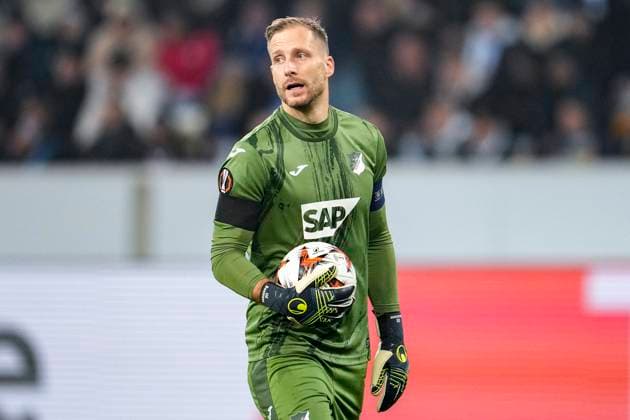 Oliver Baumann Goalkeeper, Hoffenheim, 1 , on the ball, single image, single photo, action, action, 07 11 2024, Sinsheim Germany , Football, UEFA Europa League, group stage, TSG 1899 Hoffenheim Olympique Lyon, REGULATIONS PROHIBIT ANY USE OF PHOTOGRAPHS AS IMAGE SEQUENCES AND OR QUASI VIDEO xozx