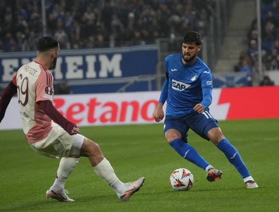 Europa League, TSG 1899 Hoffenheim vs Olympique Lyon 07 11 2024, PreZero Arena, Sinsheim, Europa League, TSG 1899 Hoffenheim vs Olympique Lyon , pictured Georges Mikautadze Lyon , Florian Grillitsch Hoffenheim Sinsheim PreZero Arena Germany ,EDITORIAL USE ONLY