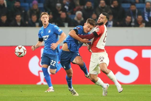 07 11 2024, xtvx, Football UEFA Europa League, TSG 1899 Hoffenheim Olympique Lyon emspor, v l Zweikampf, Duell, duel, tackle, compete Tom Bischof TSG 1899 Hoffenheim Georges Mikautadze Olympique Lyon DFL DFB REGULATIONS PROHIBIT ANY USE OF PHOTOGRAPHS as IMAGE SEQUENCES and or QUASI VIDEO Sinsheim