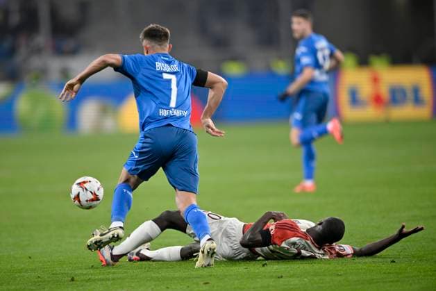 Duel, action Sael Kumbedi Olympique Lyon Lyonnais OL 20 on the ground against Tom Bischof TSG 1899 Hoffenheim 07 TSG 1899 Hoffenheim vs Olympique Lyonnais Lyon 07 11 2024 DFL REGULATIONS PROHIBIT ANY USE OF PHOTOGRAPHS AS IMAGE SEQUENCES AND OR QUASI VIDEO TSG 1899 Hoffenheim vs Olympique Lyonnais Lyon