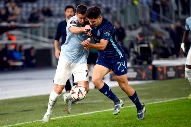 Adam Marusic of SS Lazio and Francisco Moura of FC Porto compete for the ball during the Europa League football match between SS Lazio and FC Porto at Olimpico stadium in Rome (Italy), November 7, 2024. AntoniettaxBaldassarre