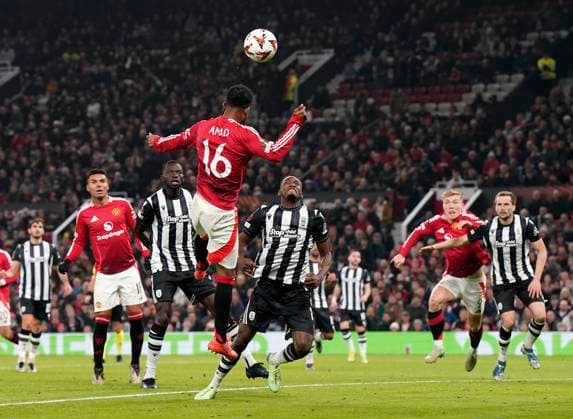 Manchester, England, 7th November 2024. Amad Diallo of Manchester United, ManU scores and celebrates scoring his sides opening goal during the UEFA Europa League match at Old Trafford, Manchester. Picture credit should read: Andrew Yates Sportimage EDITORIAL USE ONLY. No use with unauthorised audio, video, data, fixture lists, club league logos or live services. Online in-match use limited to 120 images, no video emulation. No use in betting, games or single club league player publications. SPI-3442-0032