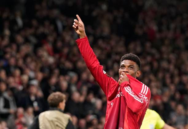 Manchester, England, 7th November 2024. Amad Diallo of Manchester United, ManU scores and celebrates scoring his sides opening goal during the UEFA Europa League match at Old Trafford, Manchester. Picture credit should read: Andrew Yates Sportimage EDITORIAL USE ONLY. No use with unauthorised audio, video, data, fixture lists, club league logos or live services. Online in-match use limited to 120 images, no video emulation. No use in betting, games or single club league player publications. SPI-3442-0047