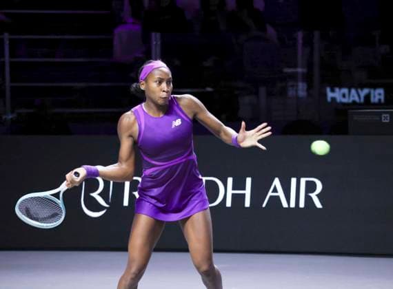 (241108) -- RIYADH, Nov. 8, 2024 -- Coco Gauff of the United States hits a return during the round robin match against Barbora Krejcikova of the Czech Republic at WTA, Tennis Damen Finals tennis tournament in Riyadh, Saudi Arabia, Nov. 7, 2024. ) (SP)SAUDI ARABIA-RIYADH-TENNIS-WTA FINALS-KREJCIKOVA VS GAUFF LuoxChen 