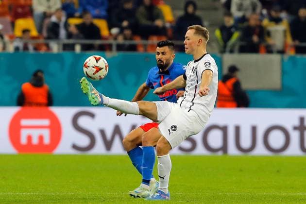 (241108) -- BUCHAREST, Nov. 8, 2024 -- FCSB s Valentin Cretu (L) vies with FC Midtjylland s Joel Andersson during a UEFA Europa League match between FCSB and Midtjylland in Bucharest, Romania, Nov. 7, 2024. (Photo by Xinhua) (SP)ROMANIA-BUCHAREST-UEFA EUROPA LEAGUE-FCSB VS FC MIDTJYLLAND CristianxCristel 