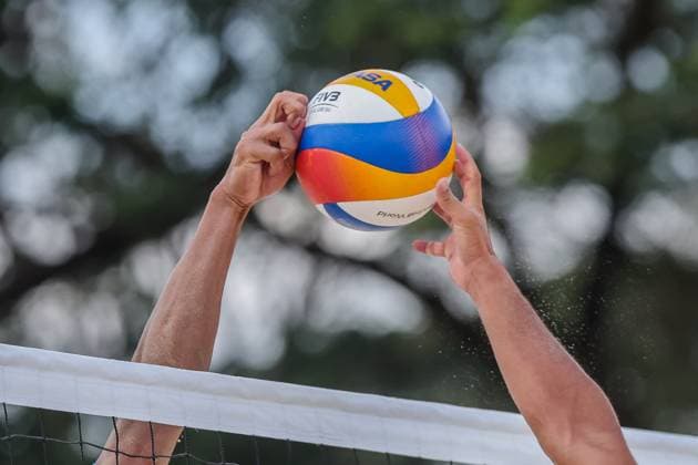 (241108) -- LAGUNA PROVINCE, Nov. 8, 2024 -- Nassim Malki (R) of Japan competes against Hasegawa Yoshiumi of Japan during the men s round 18 match between Nassim Malki Fukushima Kosuke of Japan and Hasegawa Yoshiumi Kurokawa Hiroki Dylan of Japan at the Asian Volleyball Confederation (AVC) 2024 Asian Senior Beach volleyball, Beachvolleyball Championships in Laguna Province, the Philippines, on Nov. 8, 2024. ) (SP)PHILIPPINES-LAGUNA PROVINCE-AVC 2024 ASIAN SENIOR BEACH VOLLEYBALL CHAMPIONSHIPS ROUELLExUMALI 