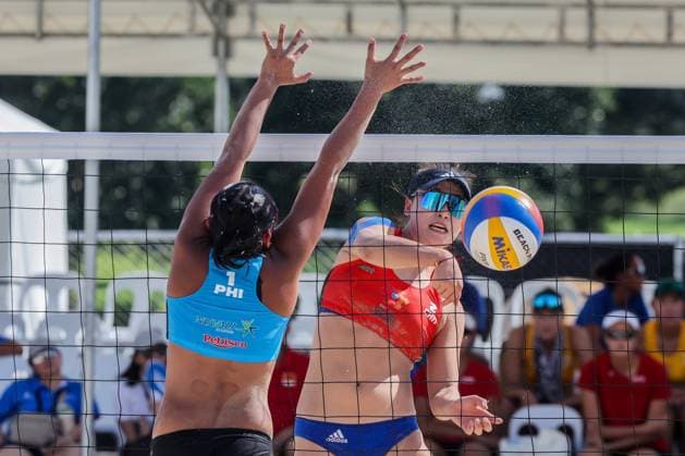 (241108) -- LAGUNA PROVINCE, Nov. 8, 2024 -- Zeng Jinjin (R) of China competes against Khylem Harl Progella of the Philippines during the women s round 16 match between Xue Chen Zeng Jinjin of China and Khylem Harl Progella Sofiah Shanine Pagara of the Philippines at the Asian Volleyball Confederation (AVC) 2024 Asian Senior Beach volleyball, Beachvolleyball Championships in Laguna Province, the Philippines on Nov. 8, 2024. ) (SP)PHILIPPINES-LAGUNA PROVINCE-AVC 2024 ASIAN SENIOR BEACH VOLLEYBALL CHAMPIONSHIPS ROUELLExUMALI 