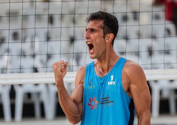 (241108) -- LAGUNA PROVINCE, Nov. 8, 2024 -- Abbas Pourasgari of Iran reacts during the men s round 16 match between Habib Akbarzadeh Kashani AmirAli GhalehNovi of Iran and Abbas Pourasgari Alireza Aghajanighasab of Iran at the Asian Volleyball Confederation (AVC) 2024 Asian Senior Beach volleyball, Beachvolleyball Championships in Laguna Province, the Philippines, on Nov. 8, 2024. ) (SP)PHILIPPINES-LAGUNA PROVINCE-AVC 2024 ASIAN SENIOR BEACH VOLLEYBALL CHAMPIONSHIPS RouellexUmali 