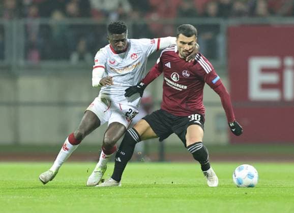 08 11 2024 Soccer Season 2024 2025 2 Soccer Bundesliga 12 Matchday 1 FC Nürnberg FCN Club 1 FC Kaiserslautern FCK Red Red Devils Sportfoto Zink DaMa xdaxmax DFL regulations prohibit any use of photographs as image sequences and or quasi video only for editorial use Afeez Aremu 23, 1 FC Kaiserslautern FCK with foul foul Mahir Emreli 30, 1 FC Nürnberg FCN