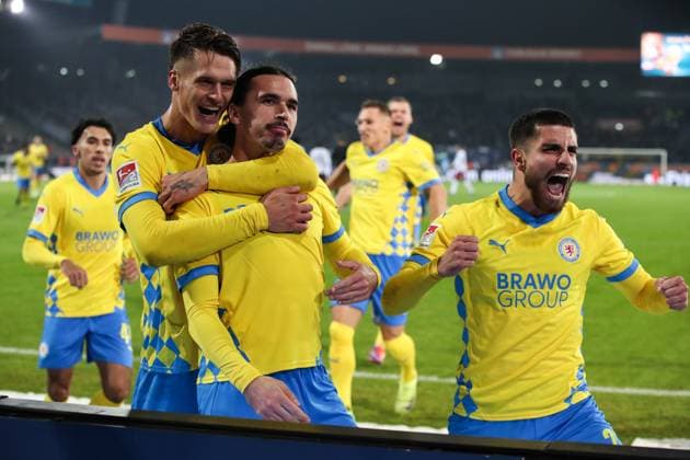 Goalscorer Rayan Philippe Eintracht Braunschweig,9 scores to 3 0 with Fabio Di Michele Sanchez Eintracht Braunschweig,22 and Levente Levi Szabo Eintracht Braunschweig,11 2 Soccer Bundesliga Season 2024 2025 Eintracht Braunschweig vs Hamburger SV at Eintracht Stadium in Braunschweig Action,Soccer,Man,Men,Germany,08 11 2024