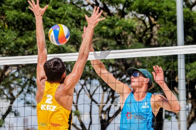 (241109) -- LAGUNA PROVINCE, Nov. 9, 2024 -- Sergey Bogatu (L) of Kazakhstan competes against D Artagnan Potts of Australia during the men s quarterfinal between Dmitriy Yakovlev Sergey Bogatu of Kazakhstan and D Artagnan Potts Jack Pearse of Australia at the Asian Volleyball Confederation (AVC) 2024 Asian Senior Beach volleyball, Beachvolleyball Championships in Laguna Province, the Philippines, on Nov. 9, 2024. ) (SP)PHILIPPINES-LAGUNA PROVINCE-AVC 2024 ASIAN SENIOR BEACH VOLLEYBALL CHAMPIONSHIPS ROUELLExUMALI 