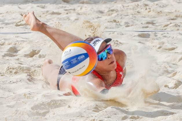 (241109) -- LAGUNA PROVINCE, Nov. 9, 2024 -- Shiba Asami of Japan saves the ball during the women s quarterfinal between Shiba Asami Maruyama Saki of Japan and Jasmine Fleming Elizabeth Alchin of Australia at the Asian Volleyball Confederation (AVC) 2024 Asian Senior Beach volleyball, Beachvolleyball Championships in Laguna Province, the Philippines, on Nov. 9, 2024. ) (SP)PHILIPPINES-LAGUNA PROVINCE-AVC 2024 ASIAN SENIOR BEACH VOLLEYBALL CHAMPIONSHIPS RouellexUmali 