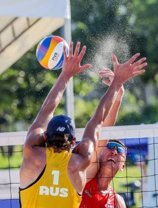(241109) -- LAGUNA PROVINCE, Nov. 9, 2024 -- Halikejiang (R) of China spikes the ball against D Artagnan Potts of Australia during the men s semifinal match between Wu Jiaxin Halikejiang of China and D Artagnan Potts Jack Pearse of Australia at the Asian Volleyball Confederation (AVC) 2024 Asian Senior Beach volleyball, Beachvolleyball Championships in Laguna Province, the Philippines, Nov. 9, 2024. ) (SP)PHILIPPINES-LAGUNA PROVINCE-AVC 2024 ASIAN SENIOR BEACH VOLLEYBALL CHAMPIONSHIPS-SEMIFINALS RouellexUmali 