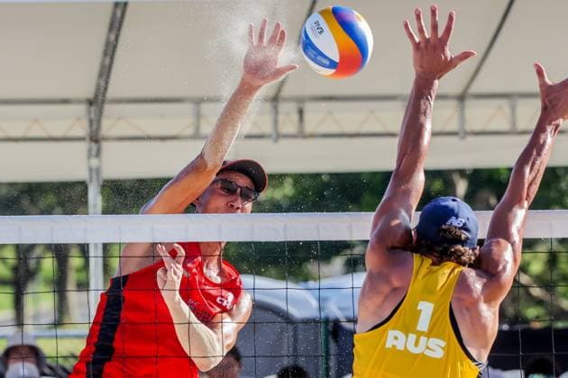 (241109) -- LAGUNA PROVINCE, Nov. 9, 2024 -- Wu Jiaxin (L) of China spikes the ball against D Artagnan Potts of Australia during the men s semifinal match between Wu Jiaxin Halikejiang of China and D Artagnan Potts Jack Pearse of Australia at the Asian Volleyball Confederation (AVC) 2024 Asian Senior Beach volleyball, Beachvolleyball Championships in Laguna Province, the Philippines, Nov. 9, 2024. ) (SP)PHILIPPINES-LAGUNA PROVINCE-AVC 2024 ASIAN SENIOR BEACH VOLLEYBALL CHAMPIONSHIPS-SEMIFINALS RouellexUmali 