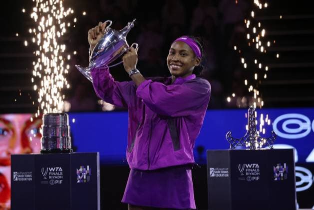 (241110) -- RIYADH, Nov. 10, 2024 -- Coco Gauff of the United States poses with the trophy during the awarding ceremony of the final match against Zheng Qinwen of China at WTA, Tennis Damen Finals tennis tournament in Riyadh, Saudi Arabia, Nov. 9, 2024. ) (SP)SAUDI ARABIA-RIYADH-TENNIS-WTA FINALS-FINAL WangxHaizhou 