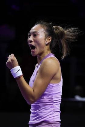 (241110) -- RIYADH, Nov. 10, 2024 -- Zheng Qinwen of China celebrates for scoring during the final match against Coco Gauff of the United States at WTA, Tennis Damen Finals tennis tournament in Riyadh, Saudi Arabia, Nov. 9, 2024. ) (SP)SAUDI ARABIA-RIYADH-TENNIS-WTA FINALS-FINAL WangxHaizhou 
