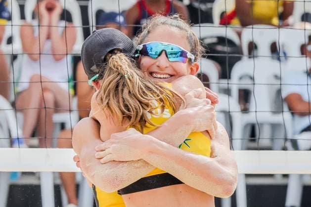 (241110) -- LAGUNA PROVINCE, Nov. 10, 2024 -- Stefanie Fejes (L) and Jana Milutinovic of Australia celebrate after winning the women s bronze medal match between Stefanie Fejes Jana Milutinovic of Australia and Shiba Asami Maruyama Saki of Japan at the Asian Volleyball Confederation (AVC) 2024 Asian Senior Beach volleyball, Beachvolleyball Championships in Laguna Province, the Philippines, on Nov. 10, 2024. ) (SP)PHILIPPINES-LAGUNA PROVINCE-AVC 2024 ASIAN SENIOR BEACH VOLLEYBALL CHAMPIONSHIPS-FINALS RouellexUmali 