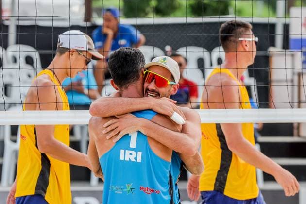 (241110) -- LAGUNA PROVINCE, Nov. 10, 2024 -- Alireza Aghajanighasab (Front R) and Abbas Pourasgari (Front L) of Iran celebrate after winning the men s bronze medal match between Abbas Pourasgari Alireza Aghajanighasab of Iran and Wu Jiaxin Halikejiang of China at the Asian Volleyball Confederation (AVC) 2024 Asian Senior Beach volleyball, Beachvolleyball Championships in Laguna Province, the Philippines, Nov. 10, 2024. ) (SP)PHILIPPINES-LAGUNA PROVINCE-AVC 2024 ASIAN SENIOR BEACH VOLLEYBALL CHAMPIONSHIPS-FINALS RouellexUmali 
