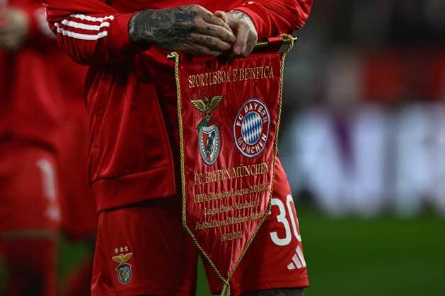 MUNICH, GERMANY - NOVEMBER 6: a close up match day pennant of S.L. Benfica during the UEFA Champions League 2024 25 League Phase MD4 match between FC Bayern Munchen and SL Benfica at Football Arena Munich on November 6, 2024 in Munich, Germany. Photo by Sebastian Frej FC Bayern Munchen v SL Benfica - UEFA Champions League 2024 25 League Phase MD4 Copyright: xSebastianxFrejx
