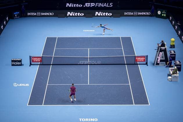 Norway s Casper Ruud returns the ball to Spain s Carlos Alcaraz during& xa0;their singles tennis match of the ATP, Tennis Herren World Tour Finals at the Inalpi Arena, in Turin, Italy - - Monday, November 11, 2024.  Copyright: xMarcoxAlpozzi LaPressex
