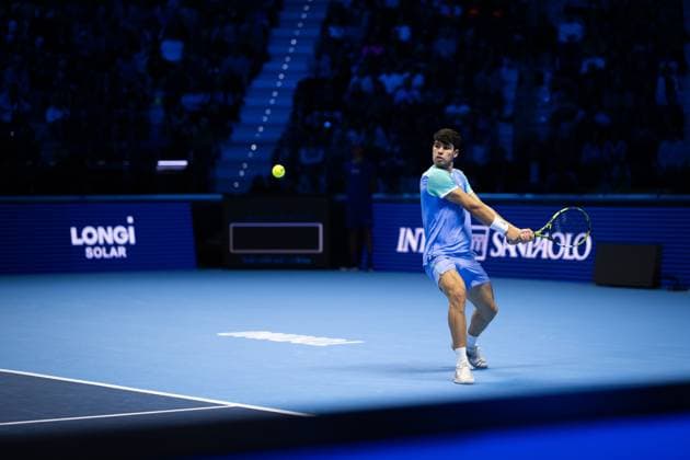 Spain s Carlos Alcaraz returns the ball to Norway s Casper Ruud during& xa0;their singles tennis match of the ATP, Tennis Herren World Tour Finals at the Inalpi Arena, in Turin, Italy - - Monday, November 11, 2024.  Copyright: xMarcoxAlpozzi LaPressex