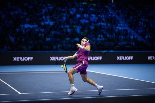 Norway s Casper Ruud returns the ball to Spain s Carlos Alcaraz during& xa0;their singles tennis match of the ATP, Tennis Herren World Tour Finals at the Inalpi Arena, in Turin, Italy - - Monday, November 11, 2024.  Copyright: xMarcoxAlpozzi LaPressex