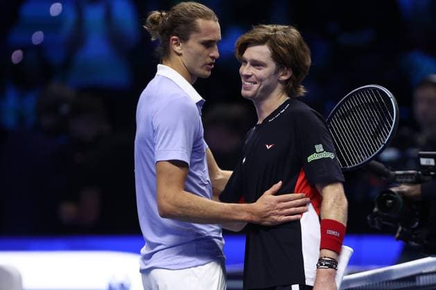 Alexander Zverev vs Andrey Rublev Alexander Zverev of Germany (L) embraces Andrey Rublev of Russia (R) at the end of the Round Robin singles match between Alexander Zverev of Germany and Andrey Rublev of Russia on Day two of the Nitto ATP, Tennis Herren World Tour Finals. Turin Inalpi Arena Italy Copyright: xMarcoxCanonierox