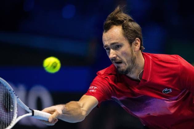 Russia s Daniil Medvedev& xa0;returns the ball to Australia s Alex de Minaur during& xa0;their singles tennis match of the ATP, Tennis Herren World Tour Finals at the Inalpi Arena, in Turin, Italy - - Tuesday, November 12, 2024.  Copyright: xMarcoxAlpozzi LaPressex