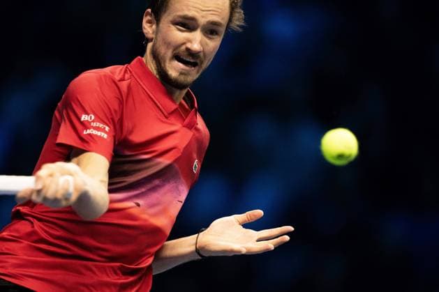 Russia s Daniil Medvedev& xa0;returns the ball to Australia s Alex de Minaur during& xa0;their singles tennis match of the ATP, Tennis Herren World Tour Finals at the Inalpi Arena, in Turin, Italy - - Tuesday, November 12, 2024.  Copyright: xMarcoxAlpozzi LaPressex