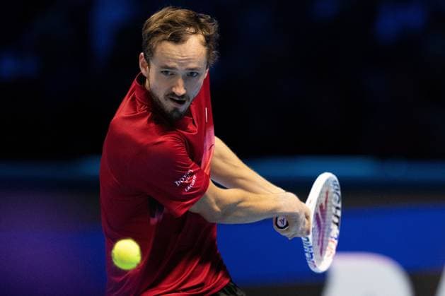 Russia s Daniil Medvedev& xa0;returns the ball to Australia s Alex de Minaur during& xa0;their singles tennis match of the ATP, Tennis Herren World Tour Finals at the Inalpi Arena, in Turin, Italy - - Tuesday, November 12, 2024.  Copyright: xMarcoxAlpozzi LaPressex