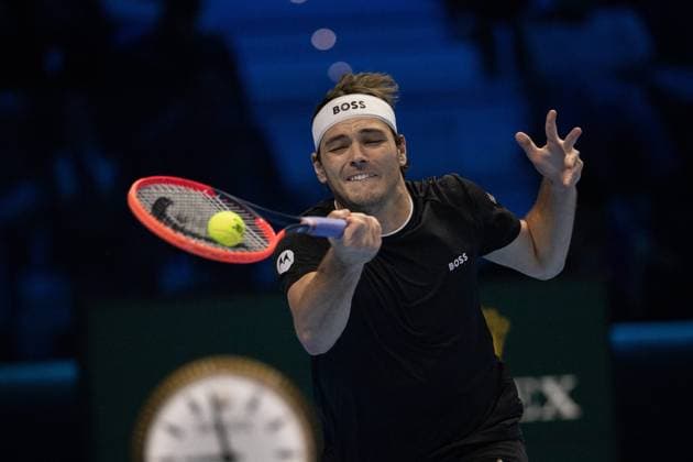 United States Taylor Fritz& xa0;returns the ball to Italy s Jannik Sinner during& xa0;their singles tennis match of the ATP, Tennis Herren World Tour Finals at the Inalpi Arena, in Turin, Italy - - Tuesday, November 12, 2024.  Copyright: xMarcoxAlpozzi LaPressex