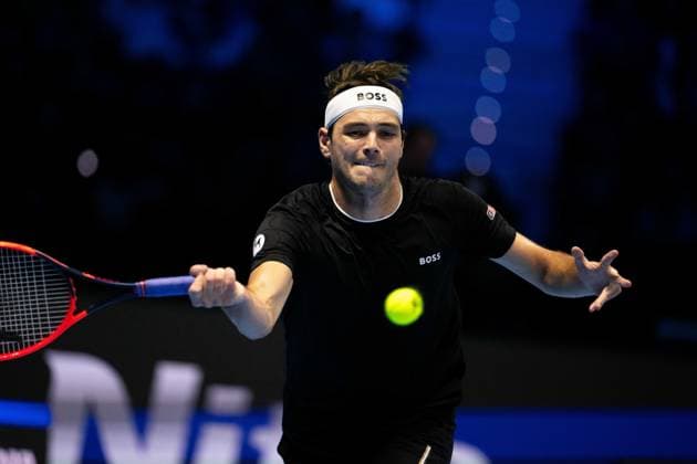 United States Taylor Fritz& xa0;returns the ball to Italy s Jannik Sinner during& xa0;their singles tennis match of the ATP, Tennis Herren World Tour Finals at the Inalpi Arena, in Turin, Italy - - Tuesday, November 12, 2024.  Copyright: xMarcoxAlpozzi LaPressex