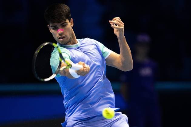 Spain s Carlos Alcaraz returns the ball to Russia s Andrey Rublev& xa0;& xa0;during& xa0;their singles tennis match of the ATP, Tennis Herren World Tour Finals at the Inalpi Arena, in Turin, Italy - - Wednesday, November 13, 2024.  Copyright: xMarcoxAlpozzi LaPressex