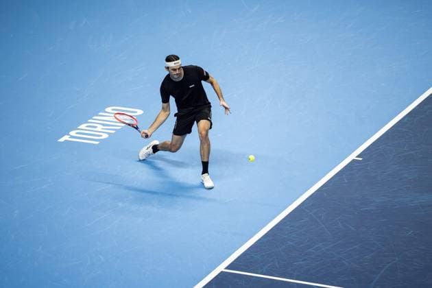 United States Taylor Fritz returns the ball to Australia s Alex de Minaur& xa0;during& xa0;their singles tennis match of the ATP, Tennis Herren World Tour Finals at the Inalpi Arena, in Turin, Italy - - Thursday, November 14, 2024.  Copyright: xMarcoxAlpozzi LaPressex