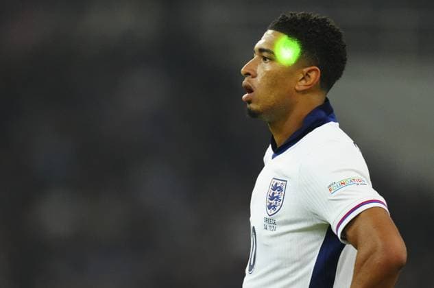 A laser pen on the face of Jude Bellingham of England Greece v England, UEFA Nations League, League B, Group 2, Football, Olympic Stadium, Athens, Greece - 14 Nov 2024 EDITORIAL USE ONLY No use with unauthorised audio, video, data, fixture lists, club league logos or live services. Online in-match use limited to 120 images, no video emulation. No use in betting, games or single club league player publications. Copyright: xJavierxGarcia Shutterstockx 14902321ah