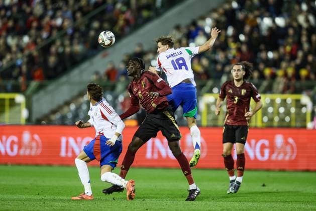 Belgium s Amadou Onana and Italian Nicolo Barella fight for the ball during a soccer game between Belgian national soccer team Red Devils and Italy, match 5 (out of 6) in the League A Group 2 of the UEFA Nations League 2025 competition, Thursday 14 November 2024 in Brussels. BRUNOxFAHY  x105418047x
