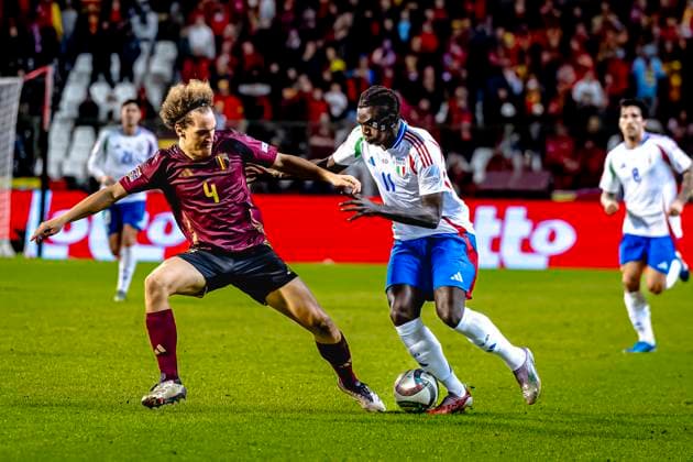 Belgium defender Wout Faes, Italy forwarder Moise Kean, during the match Belgium Italy at the King Baudouin Stadiu for the UEFA Nations League League A Group A2 season 2024 2025 in BRUSSELS, Netherlands on 14 november 2024, photo by Marcel van Dorst EYE4images DeFodi Images not used in POL SRB CRO FRA GBR NED ITA USA Defodi 746 200469 Defodi-746 not used in POL SRB CRO FRA GBR NED ITA USA