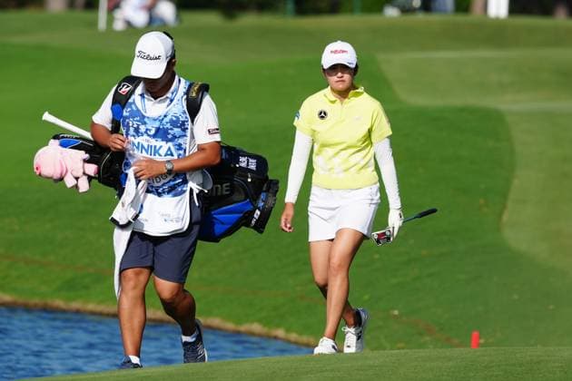 BELLEAIR, FL - NOVEMBER 14: PGA, Golf Herren player Mone Inami walks the 9th hole with her caddie on November 14, 2024, during the first round of the LPGA, Golf Damen The ANNIKA driven by Gainbridge at Pelican Golf Club in Belleair, Florida. (Photo by Brian Spurlock Icon Sportswire) GOLF: NOV 14 LPGA The ANNIKA driven by Gainbridge at Pelican EDITORIAL USE ONLY Icon241114117