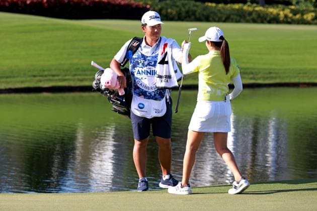 BELLEAIR, FL - NOVEMBER 14: PGA, Golf Herren player Mone Inami gets a fist bump from her caddie after making a birdie putt on the 9th hole on November 14, 2024, during the first round of the LPGA, Golf Damen The ANNIKA driven by Gainbridge at Pelican Golf Club in Belleair, Florida. (Photo by Brian Spurlock Icon Sportswire) GOLF: NOV 14 LPGA The ANNIKA driven by Gainbridge at Pelican EDITORIAL USE ONLY Icon241114122