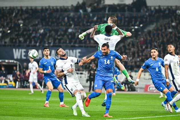 1 Jordan Pickford with 6 Marc Guehi of England compete with 14 Vangelis Pavlidis of Greece during the UEFA Nations League 2024 25 League B, Group B2 match between Greece and England on November 14, 2024 at OAKA Stadium, in Athens, Greece.  Copyright: xStefanosxKyriazis IPAxSportx xipx xx IPA_51566799 IPA_Agency_IPA51566799
