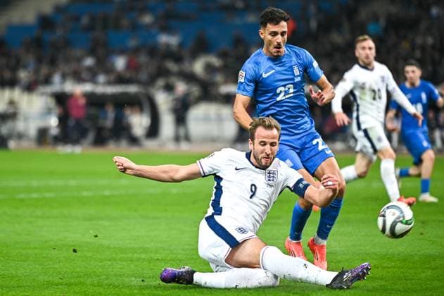 CALCIO - UEFA Nations League - Greece vs England 9 Harry Kane of England competes with 22 Dimitris Giannoulis of Greece during the UEFA Nations League 2024 25 League B, Group B2 match between Greece and England on November 14, 2024 at OAKA Stadium, in Athens, Greece. Athens Greece  Copyright: xIPAxSport ABACAx