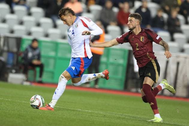 (241115) -- BRUSSELS, Nov. 15, 2024 -- Mateo Retegui (L) of Italy shoots during the UEFA Nations League 2024 25 League A football match between Belgium and Italy in Brussels, Belgium, Nov. 14, 2024. ) (SP)BELGIUM-BRUSSELS-FOOTBALL-UEFA NATIONS LEAGUE A-ITALY VS BELGIUM ZhaoxDingzhe 