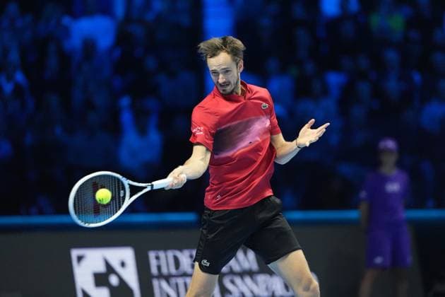 (241115) -- TURIN, Nov. 15, 2024 -- Daniil Medvedev of Russia hits a return during the round robin match against Jannik Sinner of Italy at the Nitto ATP, Tennis Herren Finals in Turin, Italy, on Nov. 14, 2024. (SP)ITALY-TURIN-TENNIS-NITTO ATP FINALS-SINNER VS MEDVEDEV (Xinhua) 