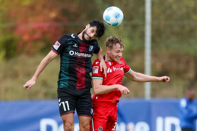 Germany, Hannover, 14 11 2024, Nachwuchsleistungszentrum NLZ, Hannover 96 vs 1 FC Magdeburg Friendly match, Mohammed El Hankouri 1 FC Magdeburg and Jannik Dehm Hannover 96 battle for the ball Hannover Nachwuchsleistungszentrum NLZ Germany eu-images-700