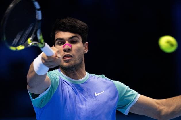 Spain s Carlos Alcaraz returns the ball to Germany s Alexander Zverev during& xa0;their singles tennis match of the ATP, Tennis Herren World Tour Finals at the Inalpi Arena, in Turin, Italy - - Friday, November 15, 2024.  Copyright: xMarcoxAlpozzi LaPressex