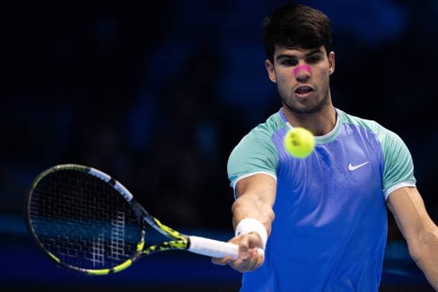Spain s Carlos Alcaraz returns the ball to Germany s Alexander Zverev during& xa0;their singles tennis match of the ATP, Tennis Herren World Tour Finals at the Inalpi Arena, in Turin, Italy - - Friday, November 15, 2024.  Copyright: xMarcoxAlpozzi LaPressex