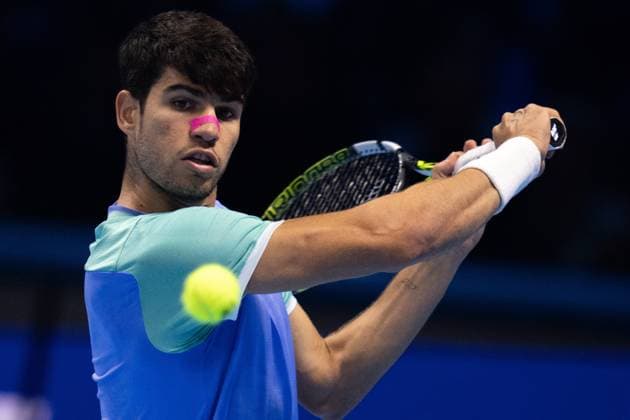Spain s Carlos Alcaraz returns the ball to Germany s Alexander Zverev during& xa0;their singles tennis match of the ATP, Tennis Herren World Tour Finals at the Inalpi Arena, in Turin, Italy - - Friday, November 15, 2024.  Copyright: xMarcoxAlpozzi LaPressex