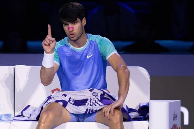 & xa0;Spain s Carlos Alcaraz react after 1 game during the singles tennis match of the ATP, Tennis Herren World Tour Finals against Germany s Alexander Zverev at the Inalpi Arena in Turin, Italy - - Friday, November 15, 2024.  Copyright: xMarcoxAlpozzi LaPressex