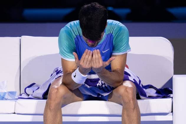 & xa0;Spain s Carlos Alcaraz react after 1 game during the singles tennis match of the ATP, Tennis Herren World Tour Finals against Germany s Alexander Zverev at the Inalpi Arena in Turin, Italy - - Friday, November 15, 2024.  Copyright: xMarcoxAlpozzi LaPressex