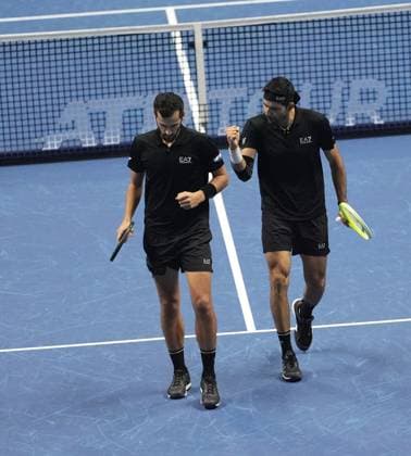 (241117) -- TURIN, Nov. 17, 2024 -- Marcelo Arevalo (R) of El Salvador and Mate Pavic of Croatia celebrate a point during the men s doubles semifinal match against Henry Patten of Britain and Harri Heliovaara of Finland at the Nitto ATP, Tennis Herren Finals in Turin, Italy, on Nov. 16, 2024. ) (SP)ITALY-TURIN-TENNIS-NITTO ATP FINALS-SEMIFINAL-MEN S DOUBLES LixJing 